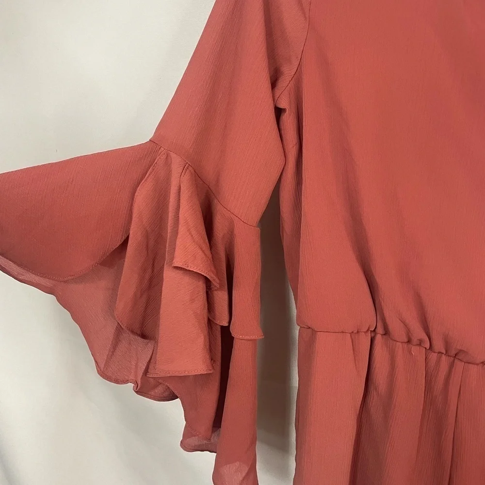 GB girls romper. Beautiful bell sleeves and a key hole back, it’s lined!